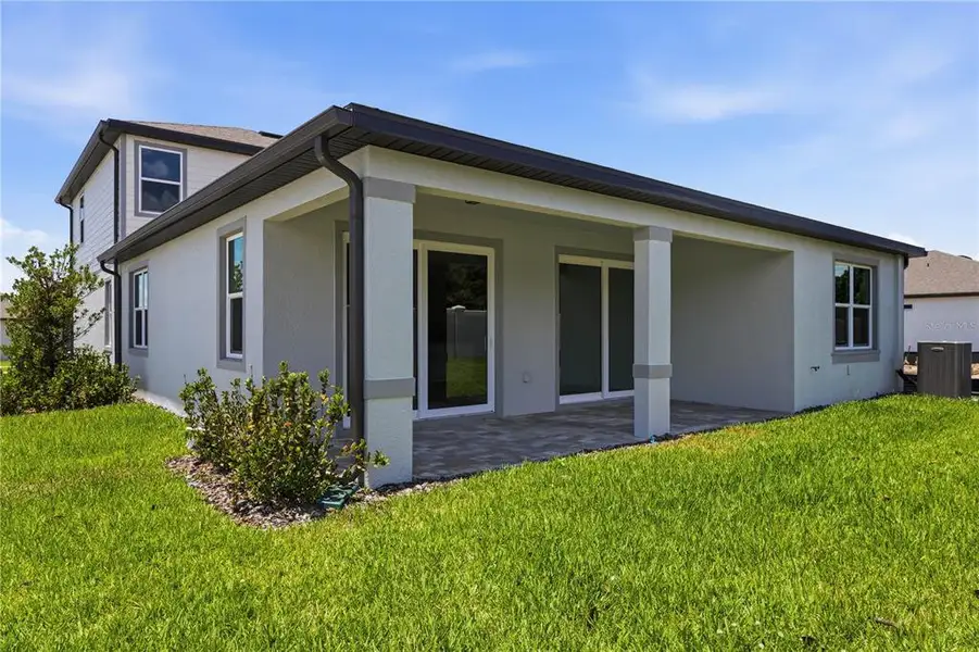Exterior details and patio area of a home in , Riverview (Image 4).