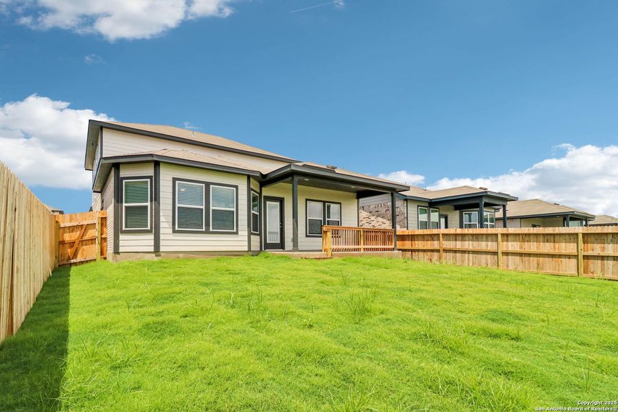 Front exterior of a new home in Sagebrooke - Premier Series, San Antonio, TX, highlighting curb appeal (Image 27). Front exterior of a new home in Sagebrooke - Premier Series, San Antonio, TX, highlighting curb appeal (Image 27).