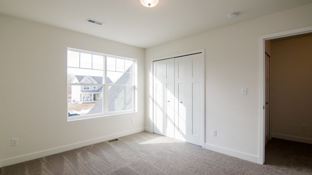 Representative unfurnished interior of a home built from the The Hartland by Norfolk Homes in Coronado Estates, Jackson (Image 70).