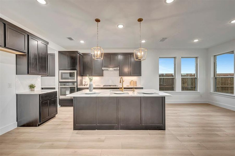Furnished interior view inside a new home in Lily Creek at Sutton Fields, Aubrey (Image 6).