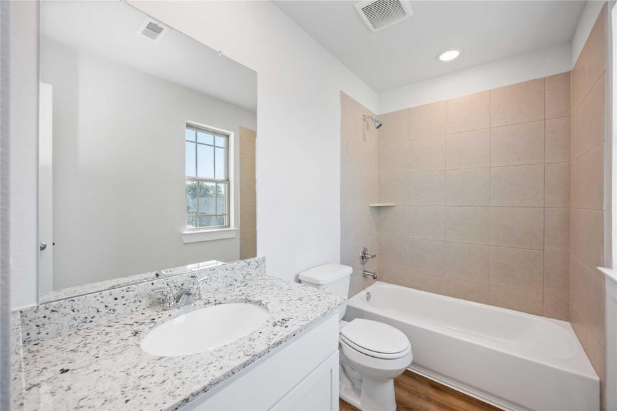 Furnished interior view inside a new home in Sandrock Station, Houston (Image 6).