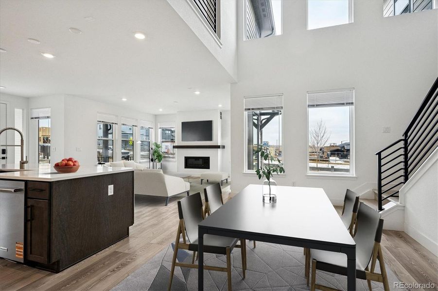 Virtually staged dining and living areas Virtually staged dining and living areas