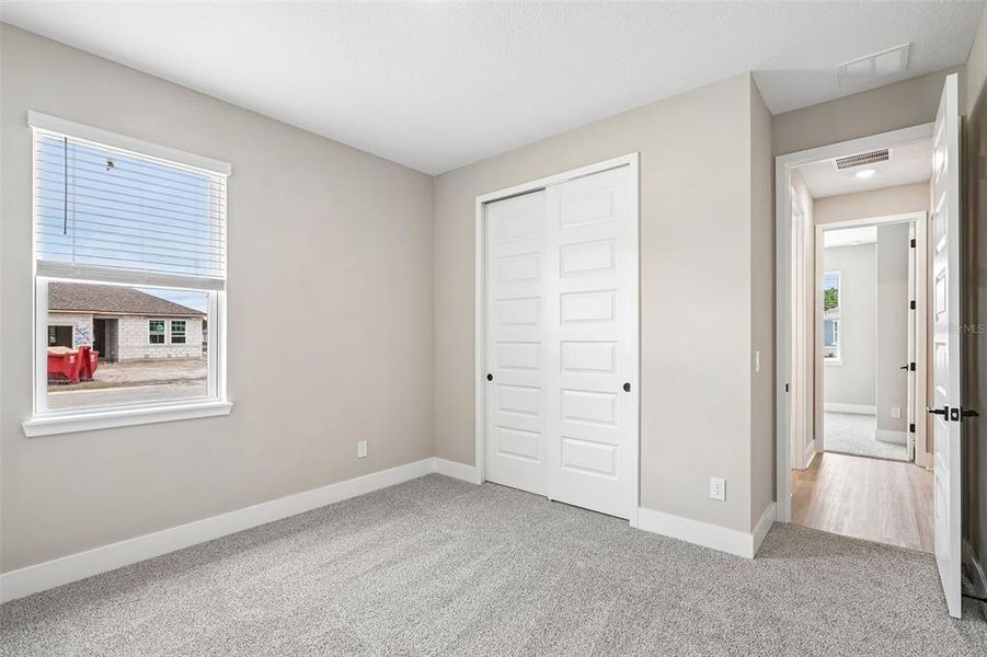 Spacious, unfurnished interior of a new home in Legends Preserve - Signature Series, Daytona Beach (Image 30).