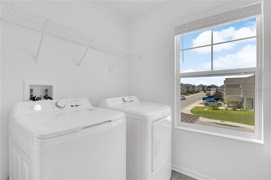 Furnished interior view inside a new home in Cascades: Grand Collection, Davenport (Image 4).