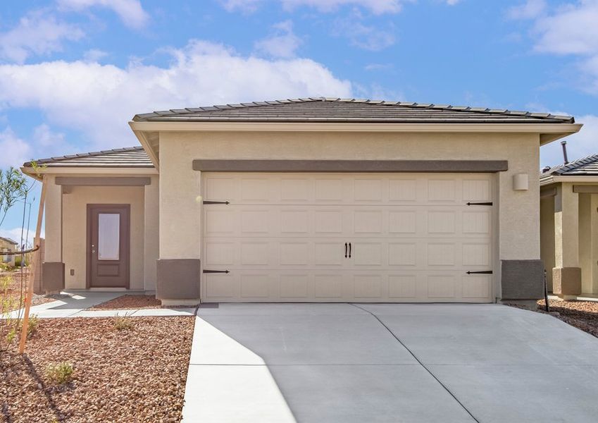 This beautiful home features a 2-car garage and professional landscaping.