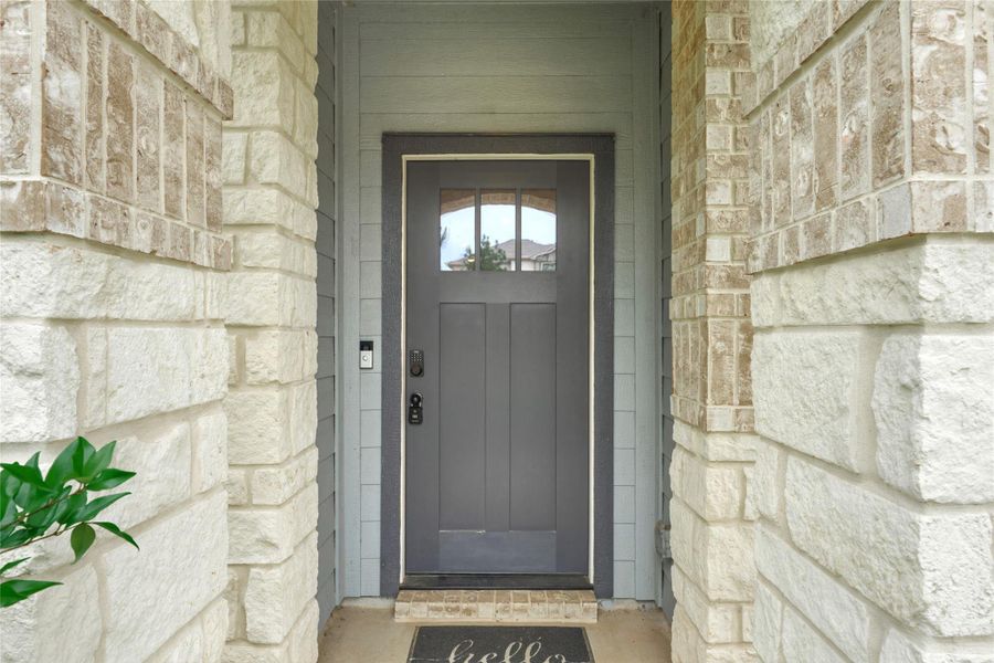Exterior details and patio area of a home in The Pines At Seven Coves, Willis (Image 4).