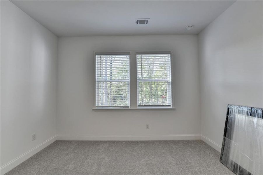 Spacious, unfurnished interior of a new home in Bailey Fence, Dacula (Image 27).