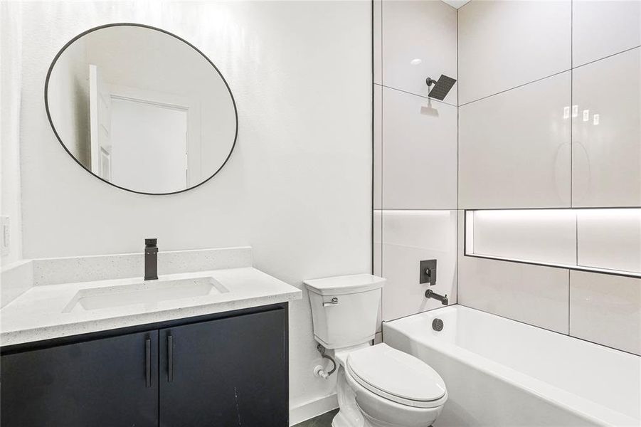 Full bathroom with vanity and tub / shower combination