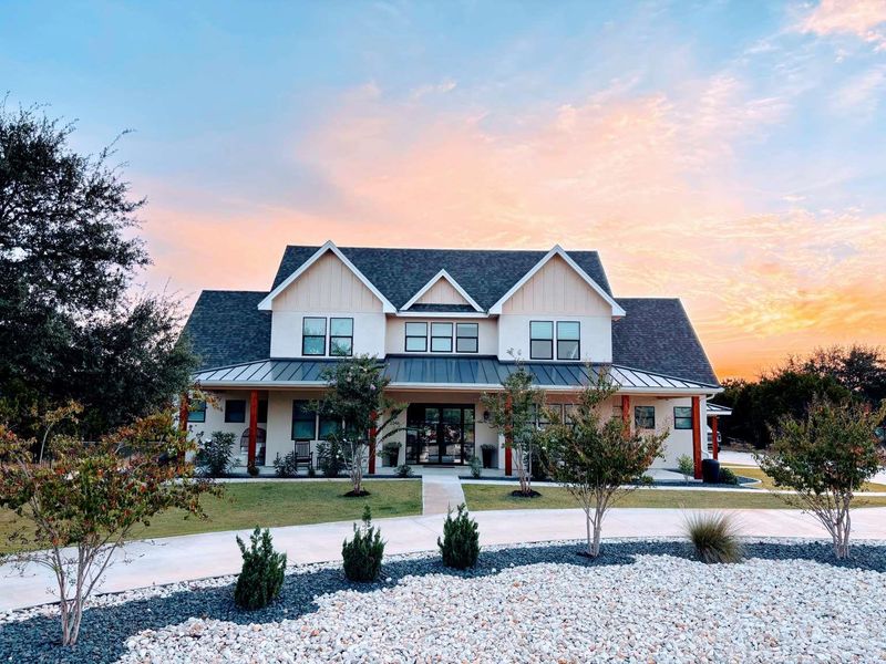 Front exterior of a new home in , New Braunfels, TX, highlighting curb appeal (Image 20). Front exterior of a new home in , New Braunfels, TX, highlighting curb appeal (Image 20).