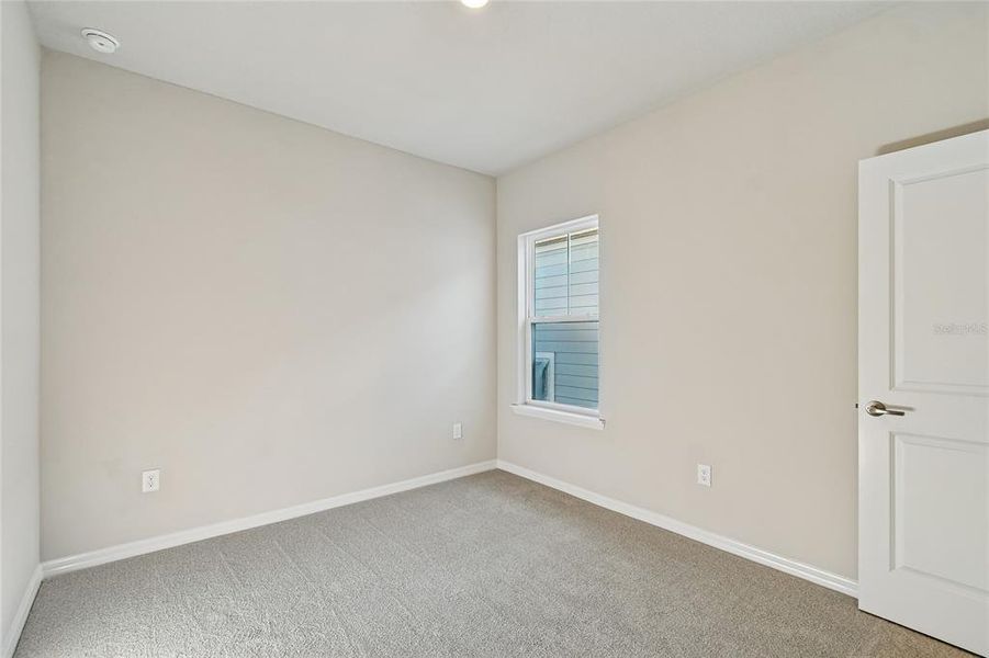 Spacious, unfurnished interior of a new home in Laureate Park at Lake Nona - Garden Series, Orlando (Image 30).