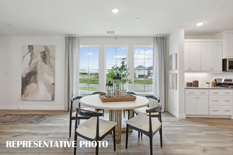 You'll be able to host fantastic family meals in this wonderful dining room!    REPRESENTATIVE PHOTO