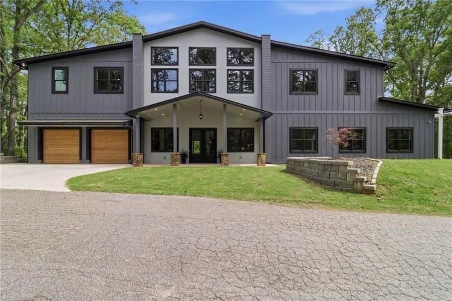 Front exterior of a new home in , Acworth, GA, highlighting curb appeal (Image 1). Front exterior of a new home in , Acworth, GA, highlighting curb appeal (Image 1).
