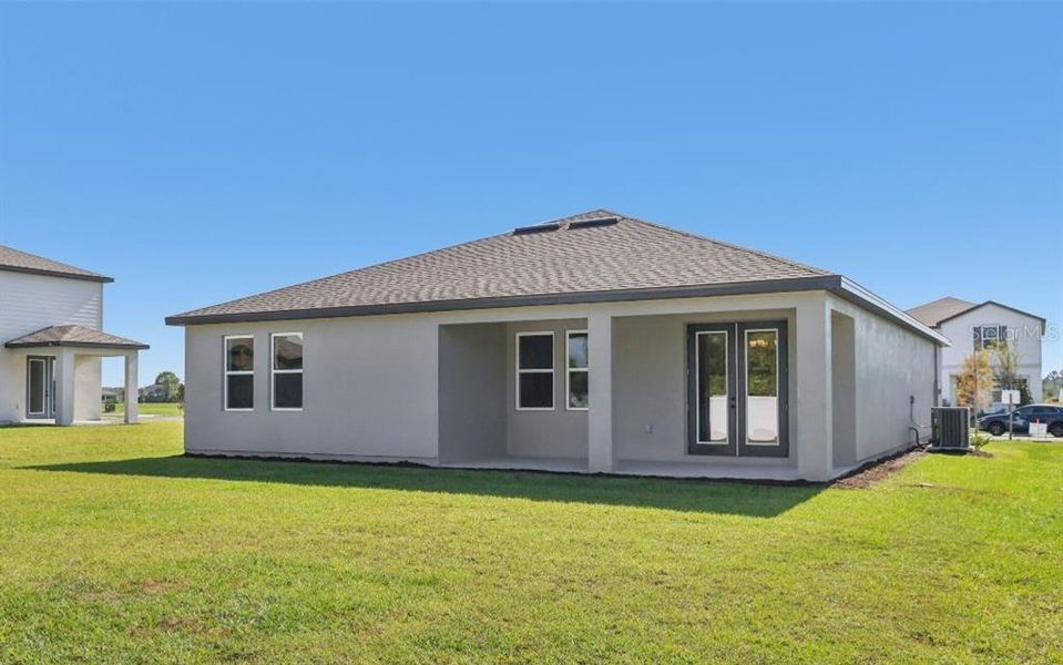 Exterior details and patio area of a home in Tyson Reserve, St. Cloud (Image 18).