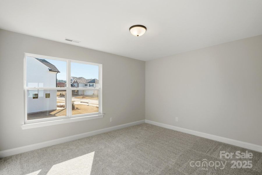 Spacious, unfurnished interior of a new home in Carrington, Stanley (Image 38).