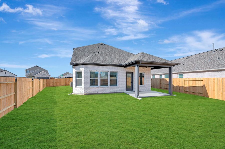Exterior details and patio area of a home in Marvida, Cypress (Image 4).