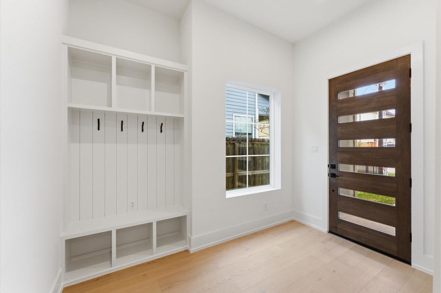 The mudroom is conveniently located upon entry and offers ample storage.