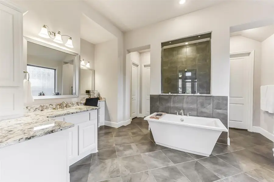 Furnished interior view inside a new home in ARTAVIA 65', Conroe (Image 6).