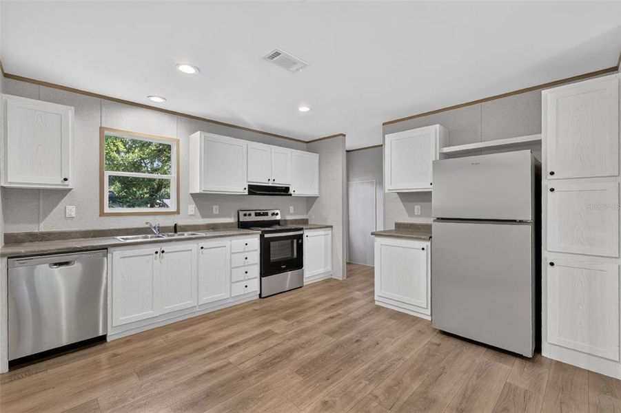 Furnished interior view inside a new home in , Wildwood (Image 3).