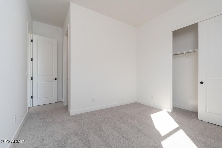 Tri Pointe Soleo 242 - Bedroom 2-1MLS