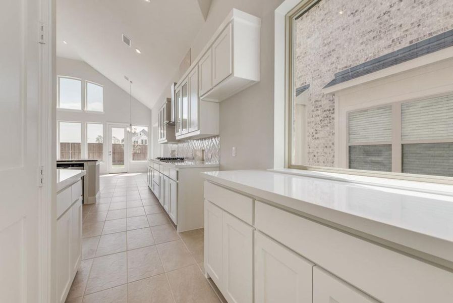 Furnished interior view inside a new home in Dominion of Pleasant Valley, Wylie (Image 11).