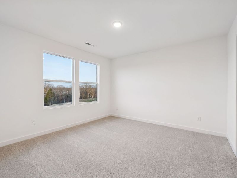 Spacious, unfurnished interior of a new home in Calista Farms, White House (Image 33).