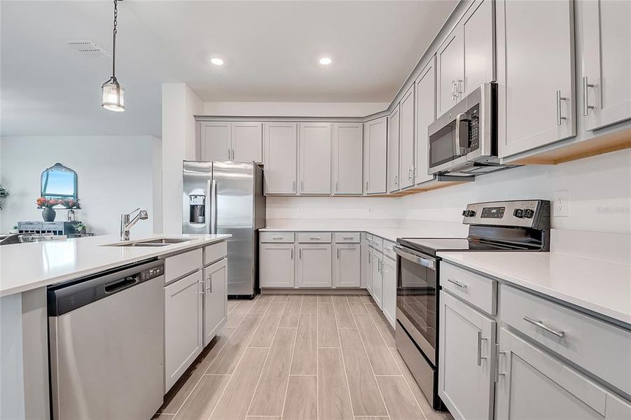 Furnished interior view inside a new home in , St. Cloud (Image 3).