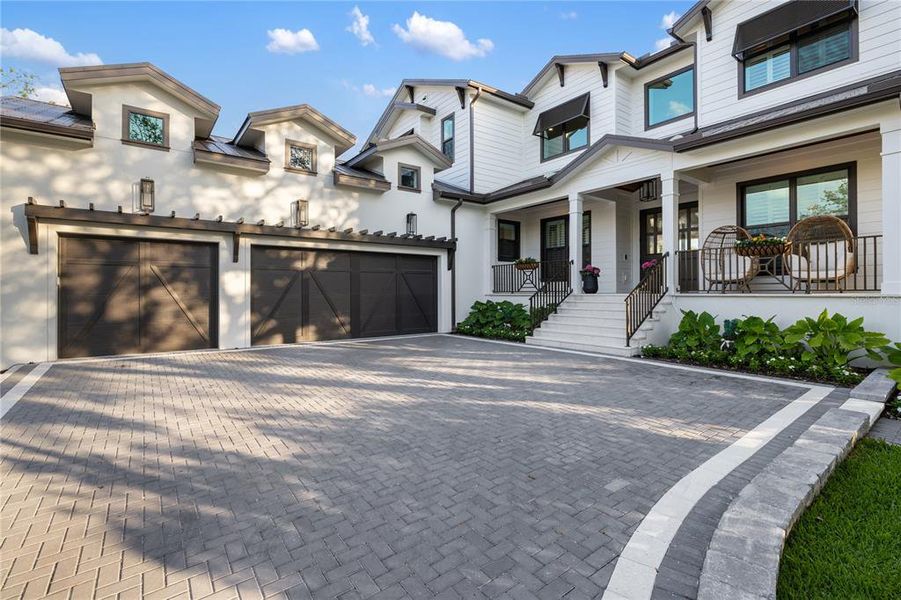 Front exterior of a new home in , Sarasota, FL, highlighting curb appeal (Image 1). Front exterior of a new home in , Sarasota, FL, highlighting curb appeal (Image 1).