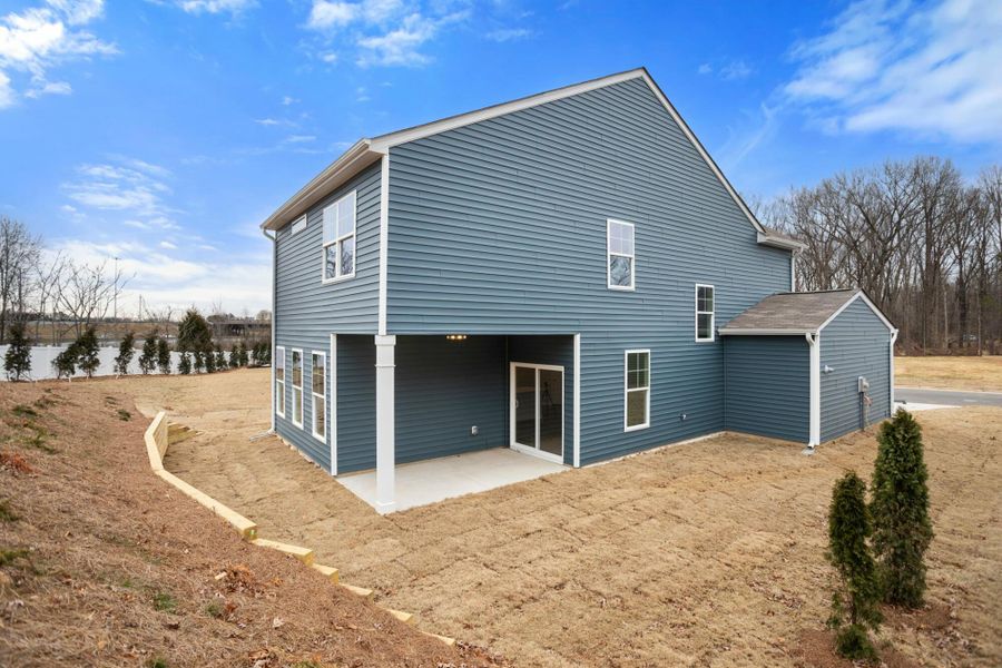 Front exterior of a new home in Chandler Ridge, McLeansville, NC, highlighting curb appeal (Image 2). Front exterior of a new home in Chandler Ridge, McLeansville, NC, highlighting curb appeal (Image 2).