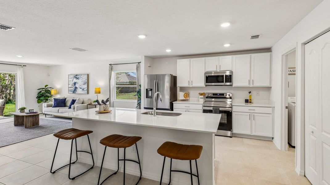 Representative furnished interior of a home built from the Marigold by Maronda Homes in Vero Lake Estates, Vero Beach (Image 8).