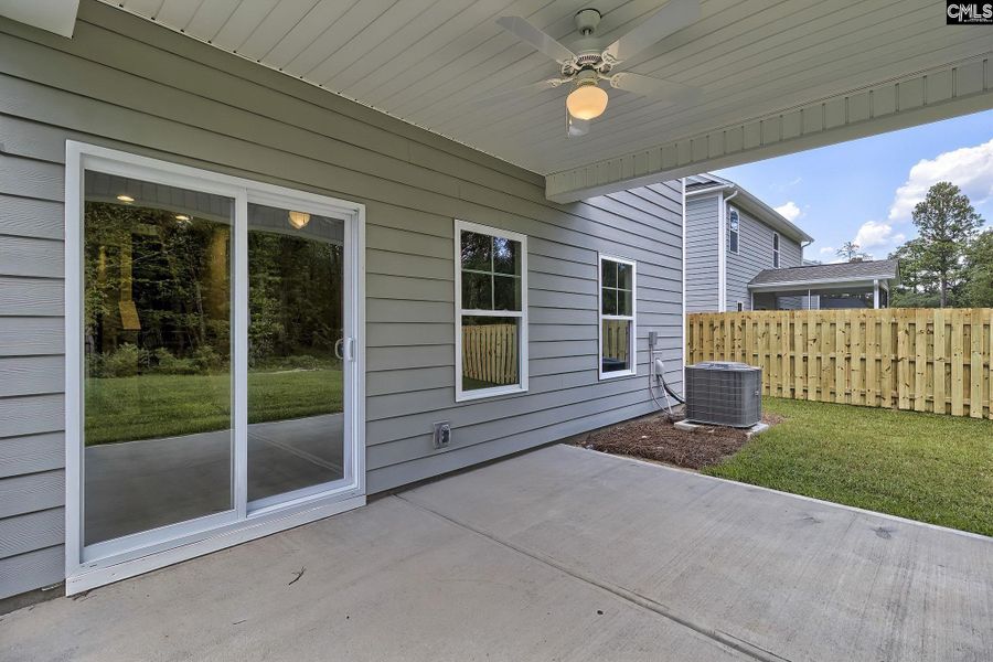 Exterior details and patio area of a home in Cottages at Roofs Pond, West Columbia (Image 3). Exterior details and patio area of a home in Cottages at Roofs Pond, West Columbia (Image 3).