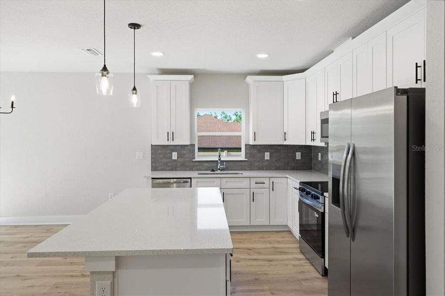 Furnished interior view inside a new home in , Weeki Wachee (Image 5).