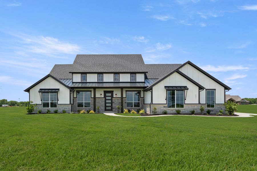 Front exterior of a new home in Pecan Acres, Red Oak, TX, highlighting curb appeal (Image 1). Front exterior of a new home in Pecan Acres, Red Oak, TX, highlighting curb appeal (Image 1).