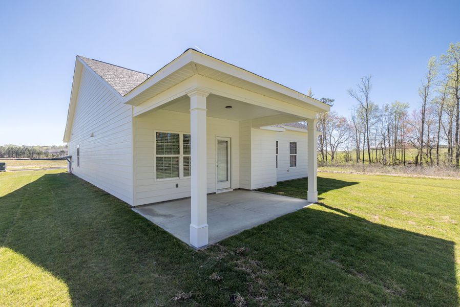 Front exterior of a new home in Millbrook, Thomson, GA, highlighting curb appeal (Image 24). Front exterior of a new home in Millbrook, Thomson, GA, highlighting curb appeal (Image 24).