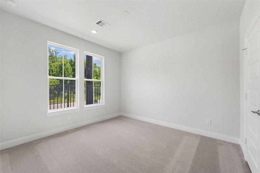 Spacious, unfurnished interior of a new home in The Corner At Buffalo Pointe, Houston (Image 23).