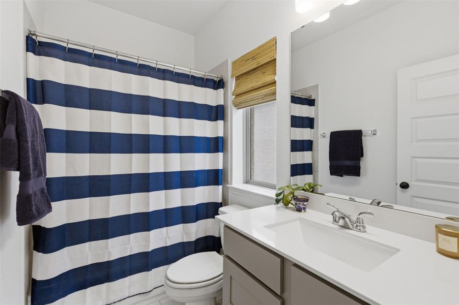 Furnished interior view inside a new home in Wolf Ranch, Georgetown (Image 25).