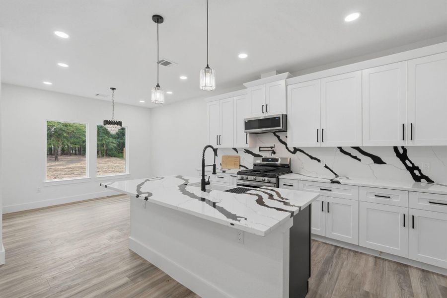Furnished interior view inside a new home in , Conroe (Image 9).