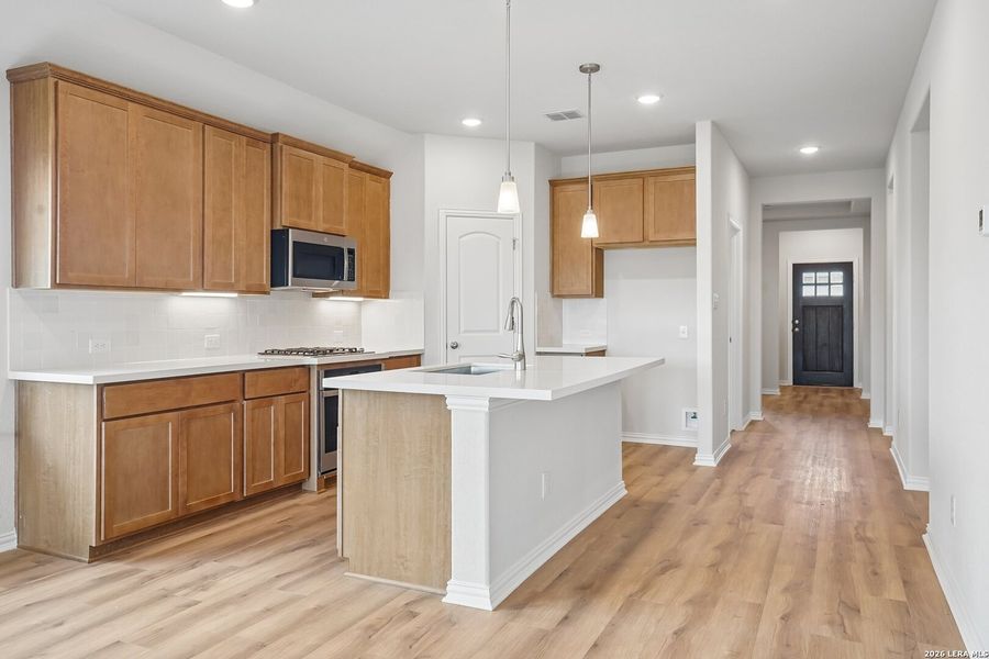 Furnished interior view inside a new home in Prairie Green, Converse (Image 9).
