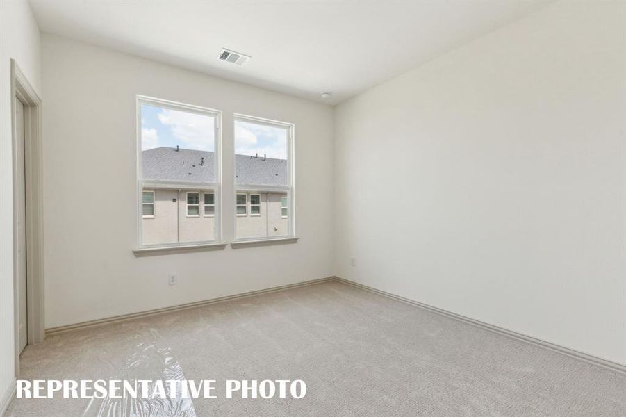 One of two nicely sized secondary bedrooms in our Riley floor plan. One of two nicely sized secondary bedrooms in our Riley floor plan.