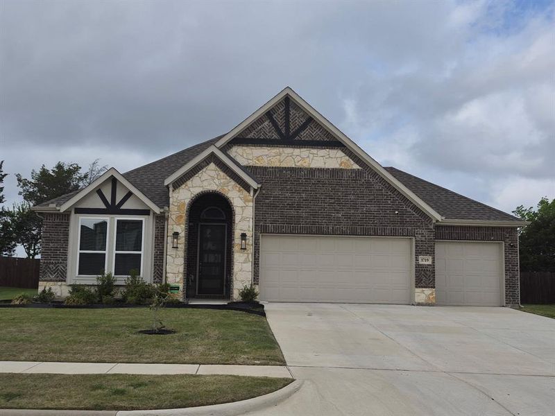 Front exterior of a new home in , Cedar Hill, TX, highlighting curb appeal (Image 6).