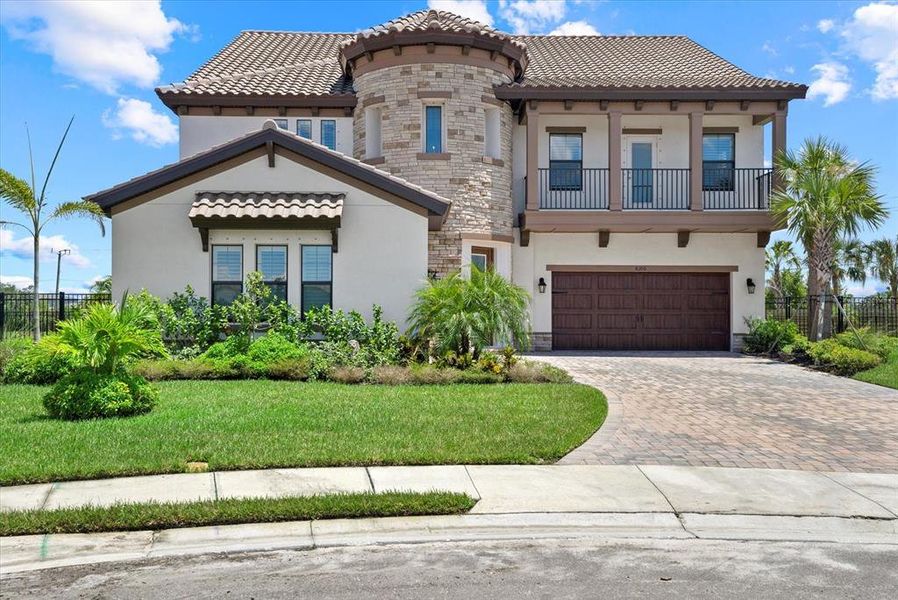 Front exterior of a new home in Crosswind Ranch, Parrish, FL, highlighting curb appeal (Image 2).
