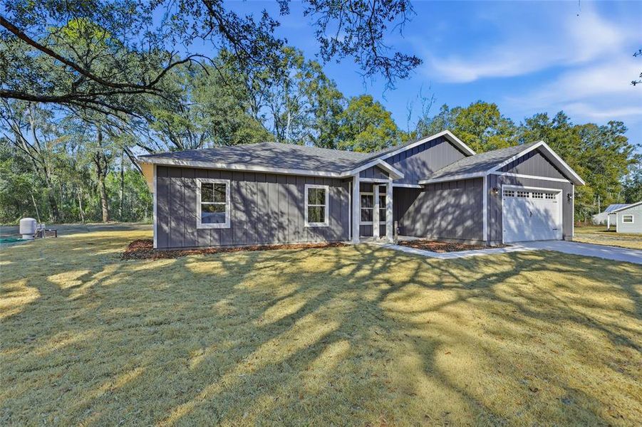 Exterior details and patio area of a home in , Archer (Image 3).