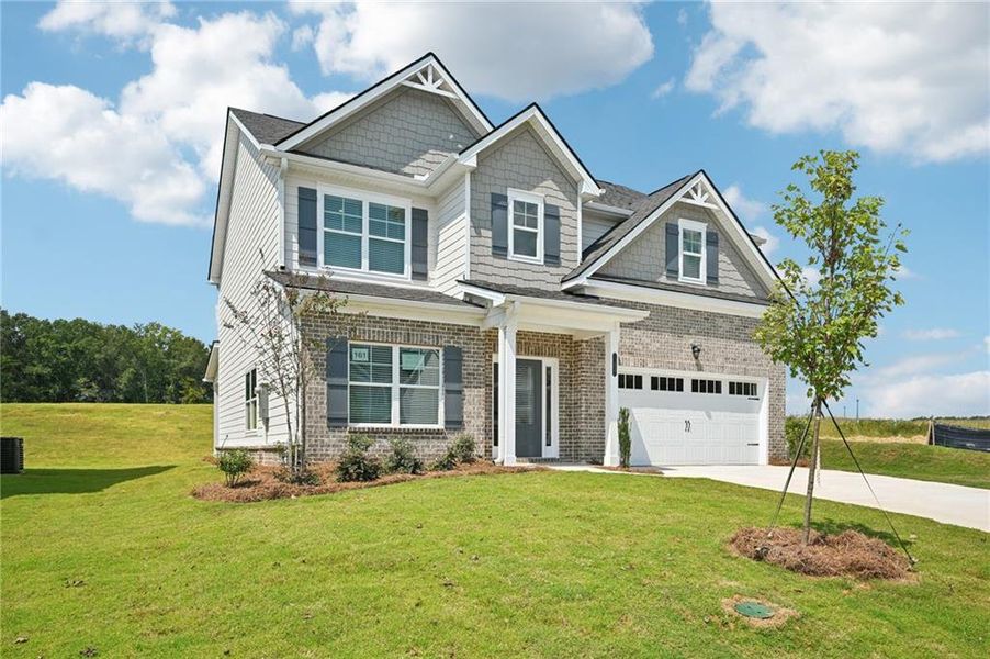 Front exterior of a new home in Neely Farm, Covington, GA, highlighting curb appeal (Image 20).