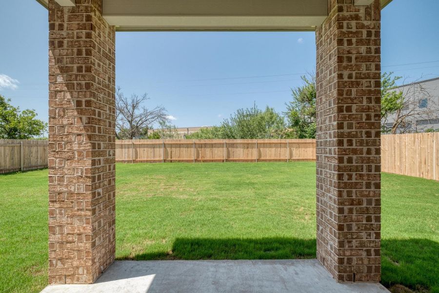 Exterior details and patio area of a home in Mustang Valley, Manor (Image 3). Exterior details and patio area of a home in Mustang Valley, Manor (Image 3).
