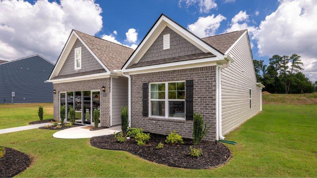 Front exterior of a new home in Sweet Briar, Ooltewah, TN, highlighting curb appeal (Image 2).