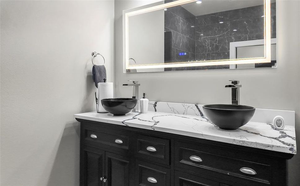 Full bath featuring vanity