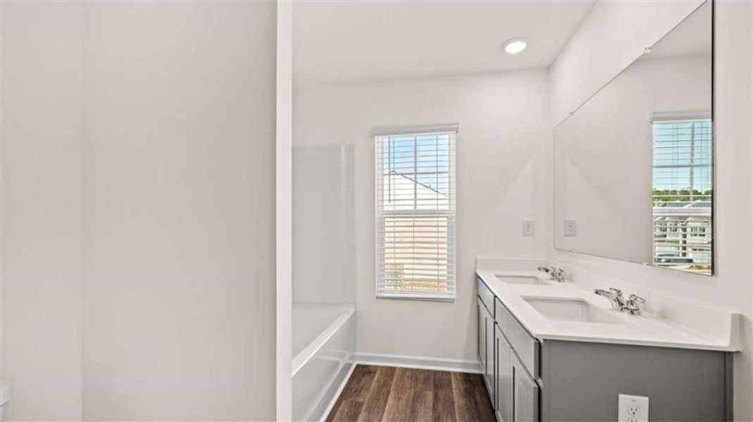 Furnished interior view inside a new home in Inverness at Sugarloaf, Lawrenceville (Image 13).