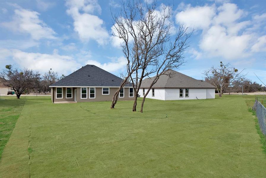 Exterior details and patio area of a home in , Runaway Bay (Image 20). Exterior details and patio area of a home in , Runaway Bay (Image 20).