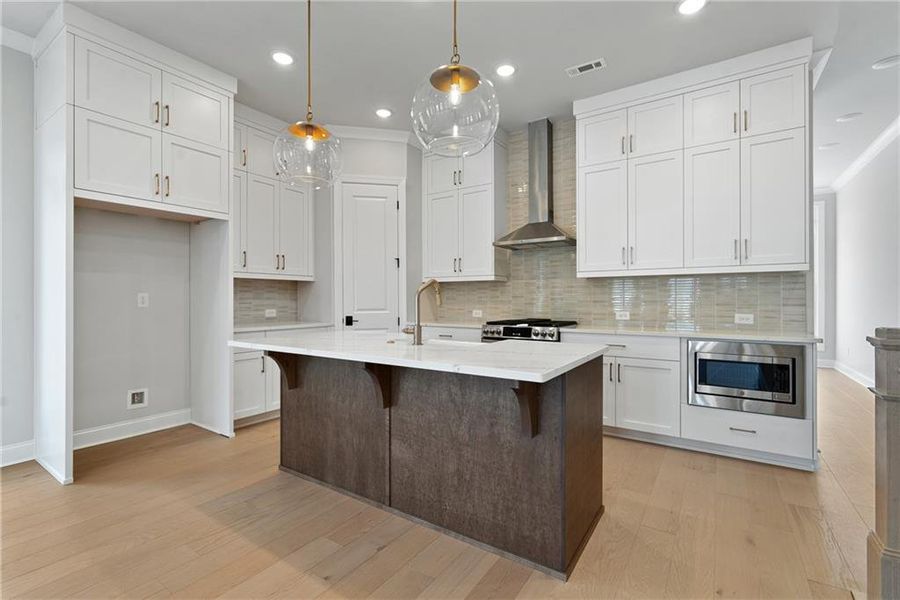 Furnished interior view inside a new home in Ward's Crossing Townhomes, Johns Creek (Image 9). Furnished interior view inside a new home in Ward's Crossing Townhomes, Johns Creek (Image 9).