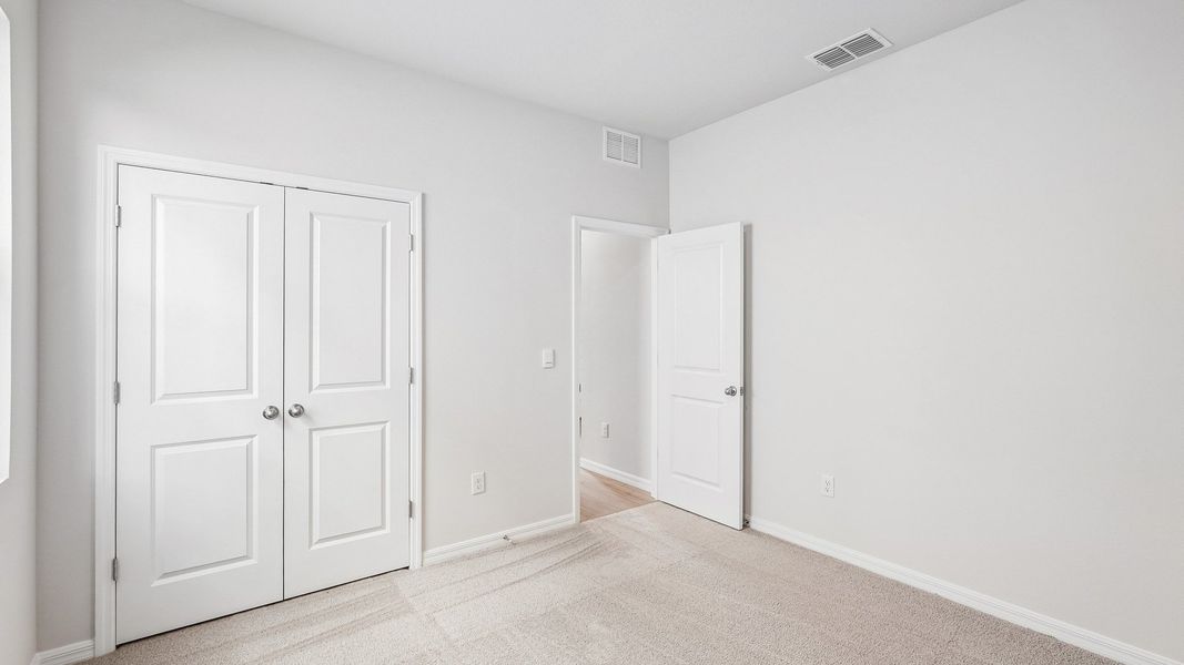 Representative unfurnished interior of a home built from the Lantana by D.R. Horton in Silverstone North, Palmetto (Image 26).