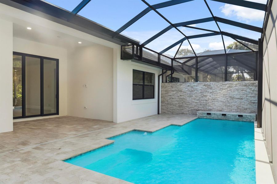 Exterior details and patio area of a home in Seaglass, Wabasso Beach (Image 33).